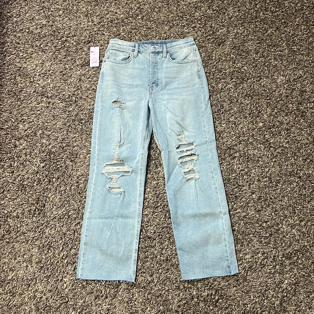 light-wash distressed straight jeans